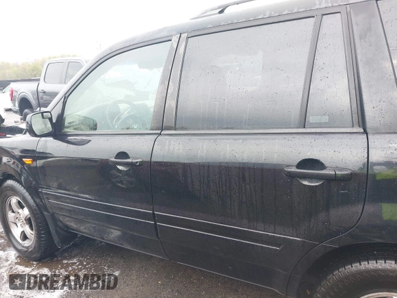 2006 Honda Pilot EX-L with VIN 5FNYF18776B021690, listed as a IAAI auction lot 42016219 with 239,666 mi miles and . Bid and sale history available at DreamBid. Image 14.