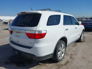 2013 Dodge Durango Crew with VIN 1C4SDJDT6DC510333, listed as a IAAI auction lot 41776099 with 180,431 mi miles and . Bid and sale history available at DreamBid. Image 4.