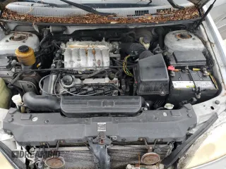 2004 Kia Sedona LX with VIN KNDUP131446570061, listed as a Copart auction lot 74222344 with 0 mi miles and Salvage Title. Bid and sale history available at carsss.com. Image 12.