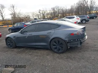 2021 Tesla Model S Long Range with VIN 5YJSA1E51MF440929, listed as a IAAI auction lot 41144902 with Not provided miles and . Bid and sale history available at DreamBid. Image 14.