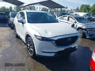 2018 Mazda CX-5 Grand Touring z VIN JM3KFBDM8J0420422, wystawiony jako IAAI lot #42188348 z przebiegiem 102 216 mil mil oraz . Historia ofert i sprzedaży dostępna na DreamBid. Obrazek 13.