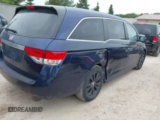2015 Honda Odyssey EX-L z VIN 5FNRL5H68FB070392, wystawiony jako IAAI lot #42412403 z przebiegiem 146 907 mil mil oraz . Historia ofert i sprzedaży dostępna na DreamBid. Obrazek 4.