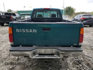 1997 Nissan Frontier XE with VIN 1N6SD16Y0VC329686, listed as a Copart auction lot 73103584 with 105,657 mi miles and Salvage title. Bid and sale history available at DreamBid. Image 6.