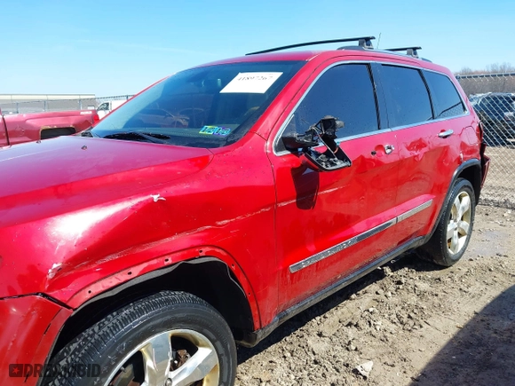 2011 Jeep Grand Cherokee Overland with VIN 1J4RR6GT7BC551649, listed as a IAAI auction lot 41897267 with 82,034 mi miles. Bid and sale history available at carsss.com. Image 6.