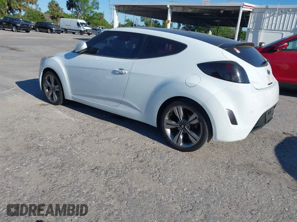 2014 Hyundai Veloster with VIN KMHTC6AD5EU193136, listed as a IAAI auction lot 41836596 with 160,460 mi miles. Bid and sale history available at carsss.com. Image 3.