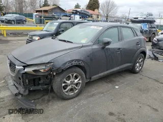 2016 Mazda CX-3 Touring with VIN JM1DKDC78G0128766, listed as a Copart auction lot 47879695 with 84,323 mi miles and Salvage Title. Bid and sale history available at carsss.com. Image 1.
