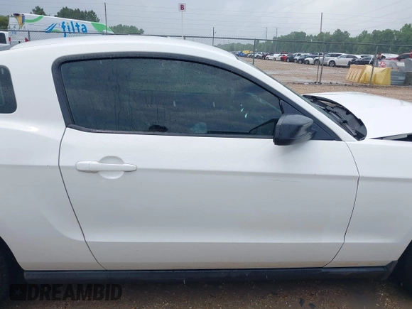 2012 Ford Mustang Premium with VIN 1ZVBP8AM3C5280537, listed as a IAAI auction lot 42171843 with 124,502 mi miles and . Bid and sale history available at carsss.com. Image 13.