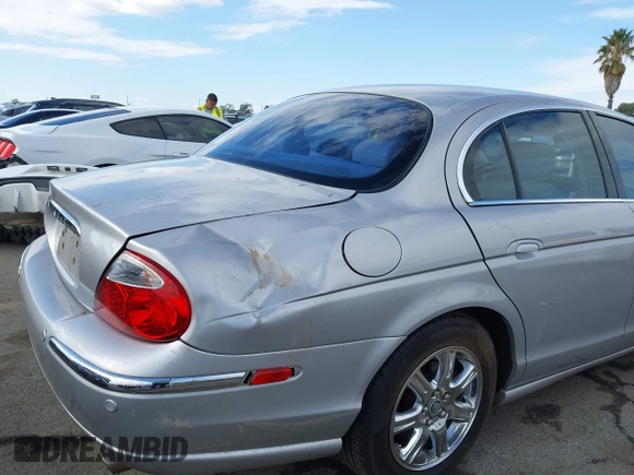 2003 Jaguar S-Type with VIN SAJEA01T83FM48713, listed as a IAAI auction lot 41402152 with 142,875 mi miles and . Bid and sale history available at DreamBid. Image 6.