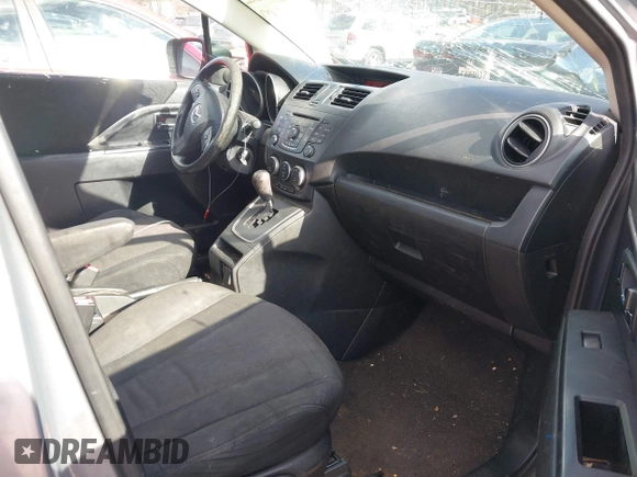 2012 Mazda 5 Sport with VIN JM1CW2BLXC0101310, listed as a IAAI auction lot 41207247 with 146,691 mi miles. Bid and sale history available at carsss.com. Image 5.