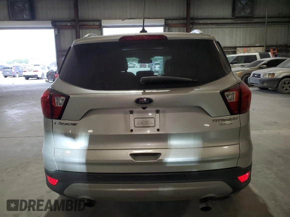 2019 Ford Escape Titanium with VIN 1FMCU0J96KUB77741, listed as a Copart auction lot 57517325 with 90,002 mi miles and Non repairable. Bid and sale history available at DreamBid. Image 6.