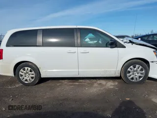 2018 Dodge Grand Caravan SE Plus with VIN 2C4RDGBG0JR138241, listed as a IAAI auction lot 41962762 with 125,644 mi miles and . Bid and sale history available at DreamBid. Image 14.