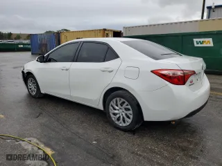 2019 Toyota Corolla L with VIN 5YFBURHE4KP901026, listed as a Copart auction lot 52007145 with 89,930 mi miles and Salvage Title. Bid and sale history available at carsss.com. Image 2.