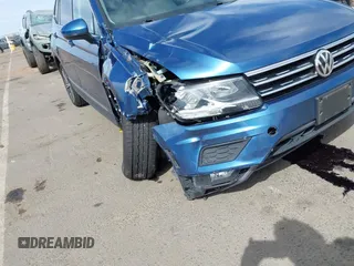 2019 Volkswagen Tiguan SE with VIN 3VV3B7AX2KM064568, listed as a IAAI auction lot 42008754 with 53,132 mi miles and . Bid and sale history available at DreamBid. Image 6.