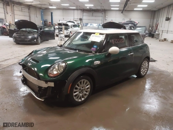 2015 MINI Cooper Hardtop S with VIN WMWXP7C57F2A39384, listed as a IAAI auction lot 41733215 with 60,750 mi miles. Bid and sale history available at carsss.com. Image 18.