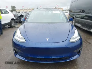 2020 Tesla Model 3 Standard Range Plus with VIN 5YJ3E1EAXLF644679, listed as a IAAI auction lot 41500595 with 53,726 mi miles and . Bid and sale history available at DreamBid. Image 12.
