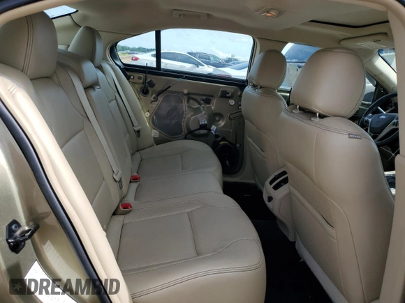 2013 Ford Taurus Limited z VIN 1FAHP2F84DG233065, wystawiony jako Copart lot #60356025 z przebiegiem 37 362 mil mil oraz Szkoda całkowita • Salvage title. Historia ofert i sprzedaży dostępna na DreamBid. Obrazek 10.