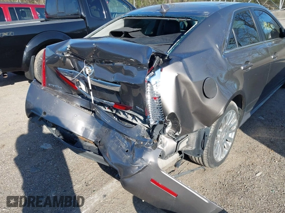 2012 Cadillac CTS Premium with VIN 1G6DS5E3XC0128264, listed as a IAAI auction lot 41964295 with 117,889 mi miles and . Bid and sale history available at DreamBid. Image 6.