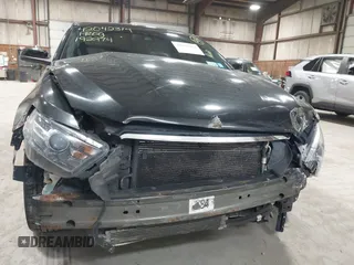 2015 Ford Taurus SHO with VIN 1FAHP2KT0FG132988, listed as a IAAI auction lot 42042314 with 192,974 mi miles and . Bid and sale history available at DreamBid. Image 6.