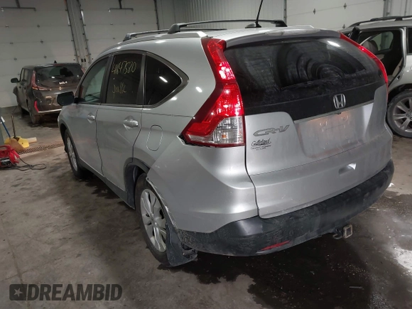 2013 Honda CR-V EX-L with VIN 2HKRM3H72DH504122, listed as a IAAI auction lot 41647580 with 217,451 mi miles and . Bid and sale history available at DreamBid. Image 3.