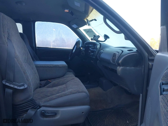 1998 Dodge Ram 1500 with VIN 1B7HF13Z7WJ104411, listed as a IAAI auction lot 41426007 with 147,186 mi miles. Bid and sale history available at carsss.com. Image 5.