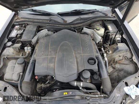 2005 Chrysler Crossfire z VIN 1C3AN59L45X042402, wystawiony jako Copart lot #70026364 z przebiegiem 107 257 mil mil oraz Szkody całkowita. Historia ofert i sprzedaży dostępna na DreamBid. Obrazek 11.