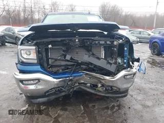 2017 GMC Sierra 1500 SLE z VIN 1GTV2MEC4HZ214619, wystawiony jako IAAI lot #41522006 z przebiegiem 184 513 mil mil oraz . Historia ofert i sprzedaży dostępna na DreamBid. Obrazek 12.