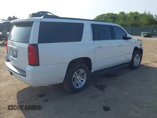 2020 Chevrolet Suburban LT z VIN 1GNSKHKC9LR198576, wystawiony jako IAAI lot #42498041 z przebiegiem 81 668 mil mil oraz . Historia ofert i sprzedaży dostępna na DreamBid. Obrazek 4.