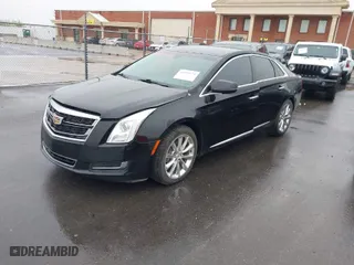 2016 Cadillac XTS Livery Package with VIN 2G61U5S38G9136327, listed as a IAAI auction lot 41935174 with 136,672 mi miles. Bid and sale history available at carsss.com. Image 2.