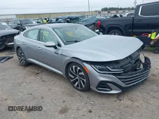 2021 Volkswagen Arteon SEL R-Line z VIN WVWSR7AN3ME004490, wystawiony jako IAAI lot #41591219 z przebiegiem 32 106 mil mil oraz . Historia ofert i sprzedaży dostępna na DreamBid. Obrazek 1.