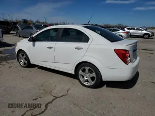 2014 Chevrolet Sonic LTZ z VIN 1G1JE5SB1E4212027, wystawiony jako Copart lot #50271495 z przebiegiem 197 857 mil mil oraz Czysty tytuł • Clean title. Historia ofert i sprzedaży dostępna na DreamBid. Obrazek 2.