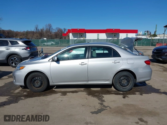 2011 Toyota Corolla L with VIN 2T1BU4EE9BC597358, listed as a IAAI auction lot 41815778 with 142,747 mi miles. Bid and sale history available at carsss.com. Image 14.