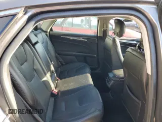 2014 Ford Fusion Titanium с VIN 3FA6P0K91ER218320, выставлен на аукционе Copart как лот 41871285 с пробегом 80 151 миль миль и На запчасти • Non repairable. История ставок и продаж доступна на DreamBid. Изображение 10.