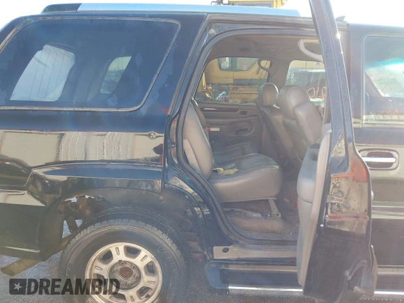 2003 Cadillac Escalade z VIN 1GYEK63N63R196238, wystawiony jako IAAI lot #41426210 z przebiegiem 296 853 mil mil oraz . Historia ofert i sprzedaży dostępna na DreamBid. Obrazek 8.