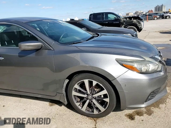 2016 Nissan Altima S with VIN 1N4AL3AP7GN379669, listed as a Copart auction lot 52988575 with 133,391 mi miles and Salvage Title. Bid and sale history available at DreamBid. Image 13.