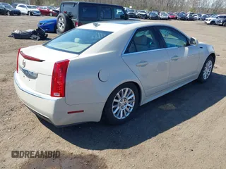 2011 Cadillac CTS Luxury with VIN 1G6DF5EY4B0114245, listed as a IAAI auction lot 42029416 with 83,473 mi miles and . Bid and sale history available at DreamBid. Image 4.