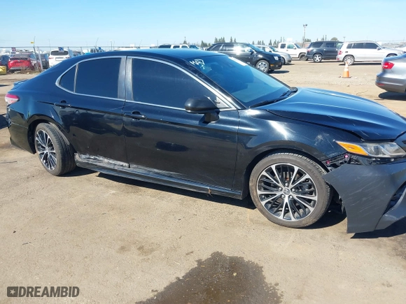 2018 Toyota Camry LE with VIN JTNB11HKXJ3071137, listed as a IAAI auction lot 41699856 with 102,310 mi miles. Bid and sale history available at carsss.com. Image 6.