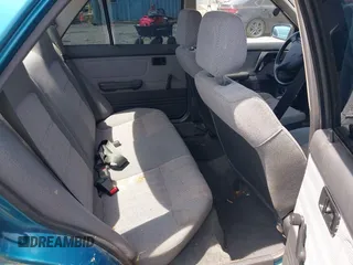1994 Mazda Protege z VIN JM1BG224XR0709466, wystawiony jako IAAI lot #42413420 z przebiegiem 65 828 mil mil oraz . Historia ofert i sprzedaży dostępna na DreamBid. Obrazek 8.