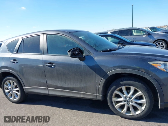 2014 Mazda CX-5 Grand Touring with VIN JM3KE4DY1E0364685, listed as a IAAI auction lot 41665349 with 135,751 mi miles. Bid and sale history available at carsss.com. Image 13.