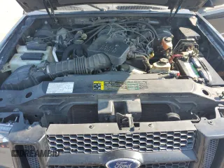 2004 Ford Explorer Sport Trac XLS with VIN 1FMZU67KX4UC35084, listed as a Copart auction lot 61967505 with 212,409 mi miles and Salvage title. Bid and sale history available at DreamBid. Image 11.