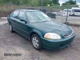 1998 Honda Civic EX with VIN 2HGEJ8640WH606707, listed as a IAAI auction lot 42753017 with 129,600 mi miles and . Bid and sale history available at DreamBid. Image 1.