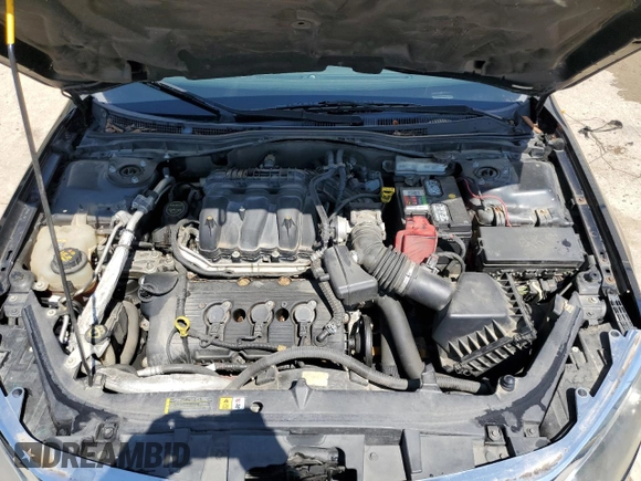 2012 Ford Fusion SE z VIN 3FAHP0HG8CR421796, wystawiony jako Copart lot #52534695 z przebiegiem 186 448 mil mil oraz Nie do naprawy • Non repairable. Historia ofert i sprzedaży dostępna na DreamBid. Obrazek 11.