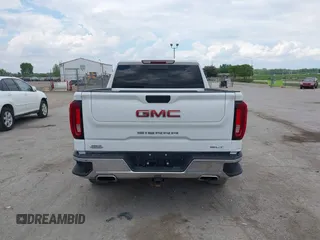 2021 GMC Sierra 1500 SLT z VIN 1GTU9DED9MZ359939, wystawiony jako IAAI lot #42245771 z przebiegiem 65 756 mil mil oraz . Historia ofert i sprzedaży dostępna na DreamBid. Obrazek 16.