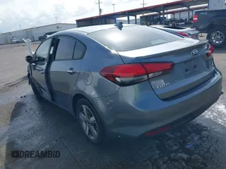 2018 Kia Forte LX with VIN 3KPFL4A79JE194864, listed as a IAAI auction lot 41657793 with 128,256 mi miles and . Bid and sale history available at DreamBid. Image 3.