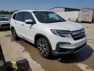 2022 Honda Pilot Elite with VIN 5FNYF6H08NB059590, listed as a Copart auction lot 57460235 with 67,593 mi miles and Salvage title. Bid and sale history available at DreamBid. Image 4.