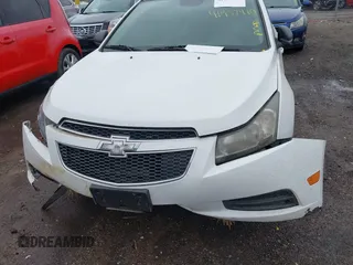 2014 Chevrolet Cruze LS with VIN 1G1PA5SH0E7145168, listed as a IAAI auction lot 41957410 with 151,422 mi miles and . Bid and sale history available at DreamBid. Image 13.