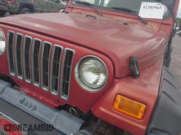 2000 Jeep Wrangler Sport with VIN 1J4FA49S2YP764321, listed as a IAAI auction lot 42385965 with Not provided miles and . Bid and sale history available at DreamBid. Image 10.