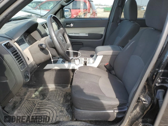 2010 Mercury Mariner with VIN 4M2CN8BG5AKJ06256, listed as a Copart auction lot 48953235 with 145,958 mi miles and Clean title. Bid and sale history available at DreamBid. Image 7.