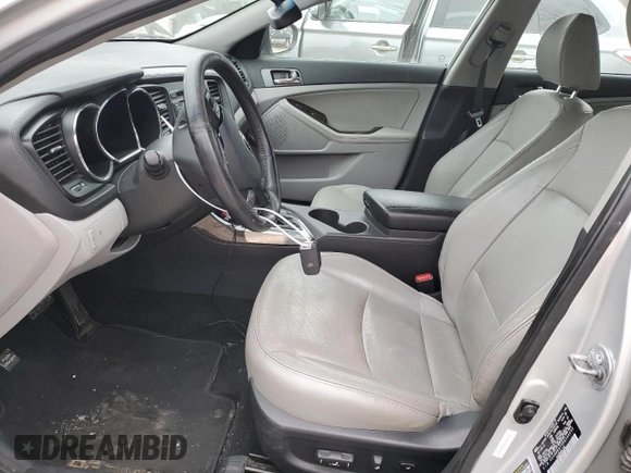2013 Kia Optima EX z VIN 5XXGN4A7XDG144632, wystawiony jako Copart lot #83599614 z przebiegiem 97 316 mil mil oraz Szkoda całkowita • Salvage title. Historia ofert i sprzedaży dostępna na DreamBid. Obrazek 7.
