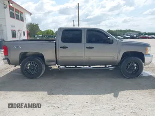 2012 Chevrolet Silverado 1500 LT with VIN 1GCPKSE7XCF183046, listed as a IAAI auction lot 41940526 with 261,566 mi miles and . Bid and sale history available at DreamBid. Image 13.