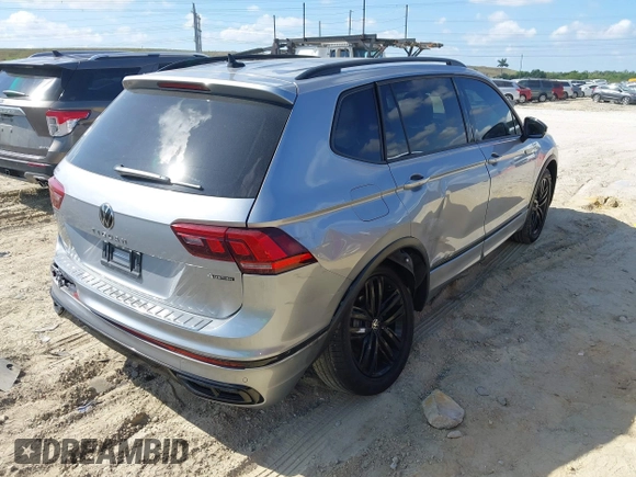 2022 Volkswagen Tiguan SE R-Line Black z VIN 3VV8B7AX3NM168318, wystawiony jako IAAI lot #41530361 z przebiegiem 31 226 mil mil oraz . Historia ofert i sprzedaży dostępna na DreamBid. Obrazek 4.